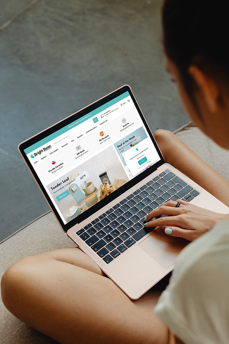 BrightBean-Website A woman using a computer
